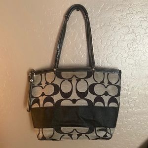 This Coach purse was given to me by a friend who no longer wanted her.